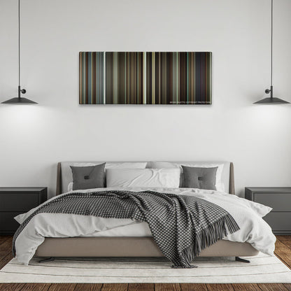 Flight color palette canvas above a bed, between two black pendant lamps