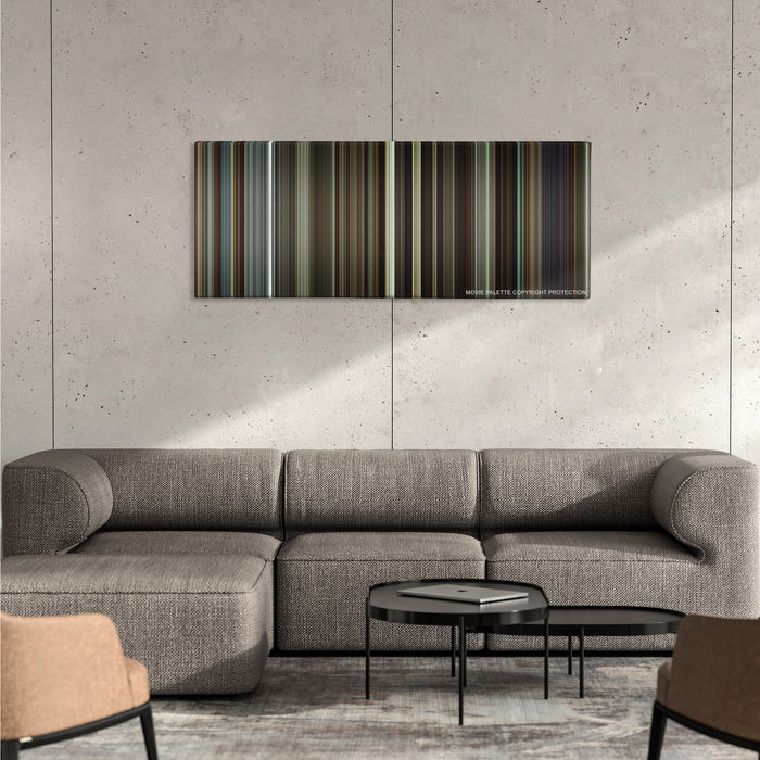 Flight color palette canvas on a concrete wall above a gray sectional sofa