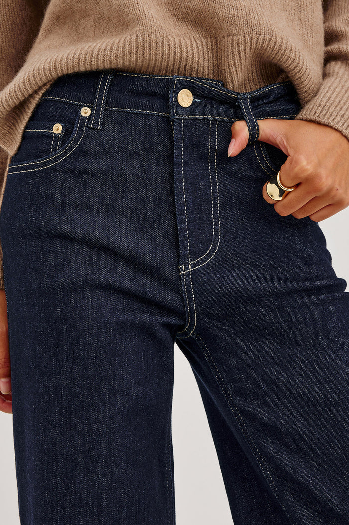 Getty Wide Leg Jean in Light Comfort-Stretch Denim With High-Rise, 5-Pockets, and Zipper Fly in After Hours Colorway - Close up front view featured on model.