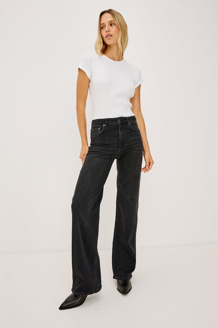 Getty Wide Leg Jean in Light Stretch Denim With 5-Pockets in Vintage Black Colorway - Full Body Front View Featured on Model