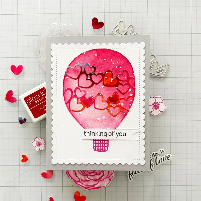 Gina K. Designs - Stamp & Die Set - Lift Me Up. Lift Me Up is a set by Lisa Hetrick. This set is made of premium clear photopolymer and measures 6" X 8". These wafer thin metal-etched dies are the highest quality for your paper crafting projects. Available at Embellish Away located in Bowmanville Ontario Canada. examples by Lisa Hetrick.