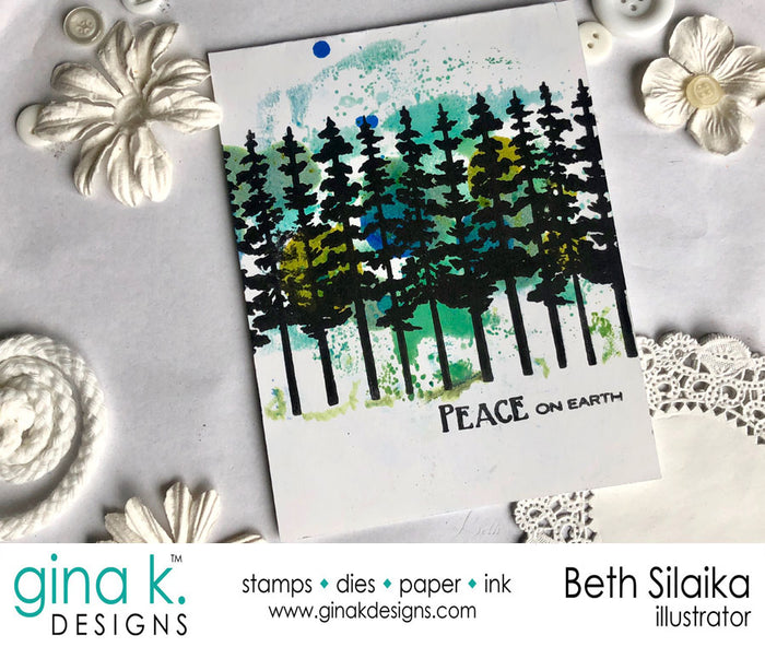 Gina K. Designs - Stamps - Tall Pines. Clear Background Stamp. This set is made of premium clear photopolymer and measures 4 x 6 inches. Made in the USA.  FEATURES Christmas, Holiday, Pine Trees, Forest. Silhouette. Available at embellishaway.ca in Bowmanville Ontario Canada. Card Example.