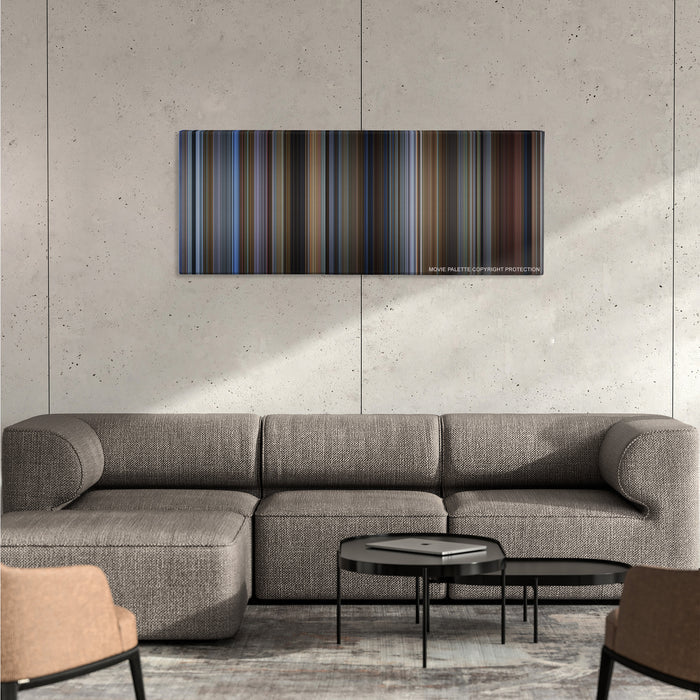 Groundhog Day color palette canvas on a concrete wall above a gray sectional sofa