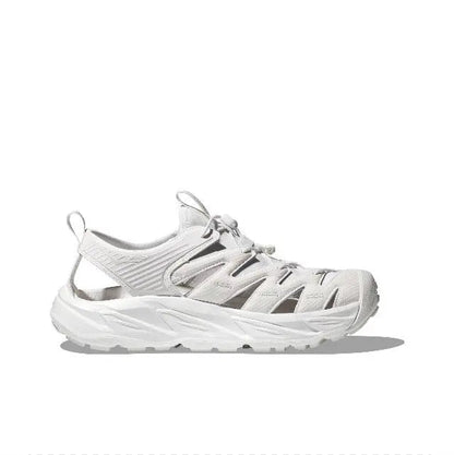 White sport sandal-style sneaker with lace-up, padded collar, and thick tread sole