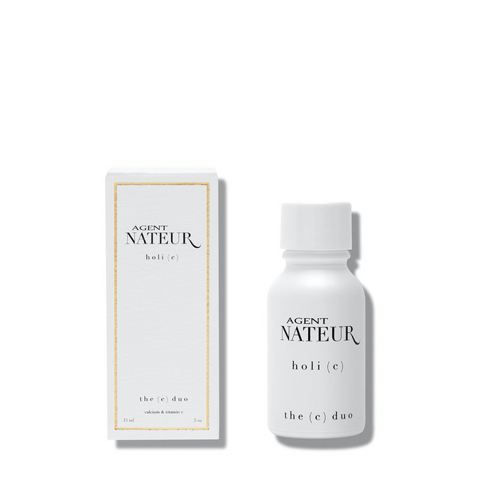 A small white bottle of Agent Nateur, holi (c), the C Duo with Calcium & Vitamin C with box next to it on a white background