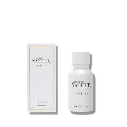 A small white bottle of Agent Nateur, holi (c), the C Duo with Calcium & Vitamin C with box next to it on a white background
