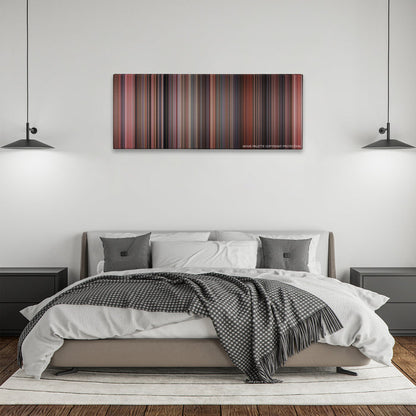 Home Alone color palette canvas above a bed, between two black pendant lamps