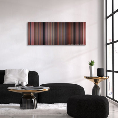 Home Alone color palette canvas above a black sofa with a gold-topped table