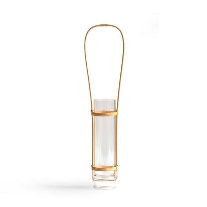 Slender glass vase with a bamboo holder sitting against white background. The natural bamboo holder has a long handle so that user can hang the vase.