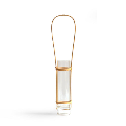 Slender glass vase with a bamboo holder sitting against white background. The natural bamboo holder has a long handle so that user can hang the vase.