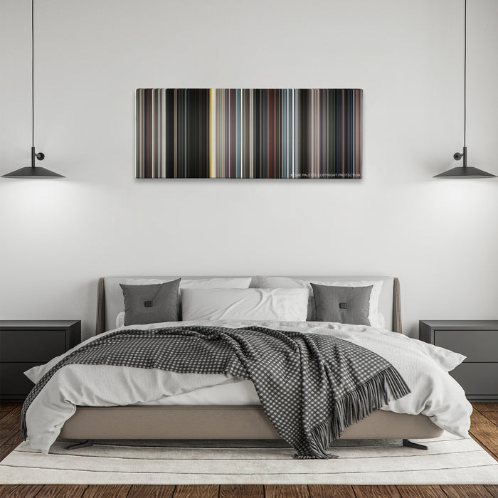 Iron Man color palette canvas above a bed, between two black pendant lamps