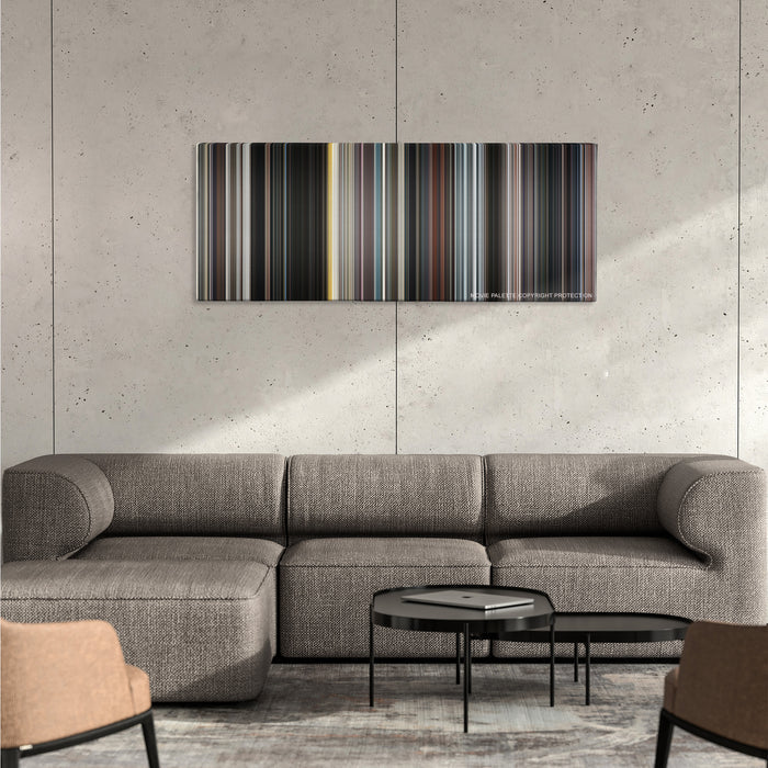 Iron Man color palette canvas on a concrete wall above a gray sectional sofa
