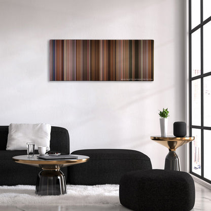 Jerry Maguire color palette canvas above a black sofa with a gold-topped table