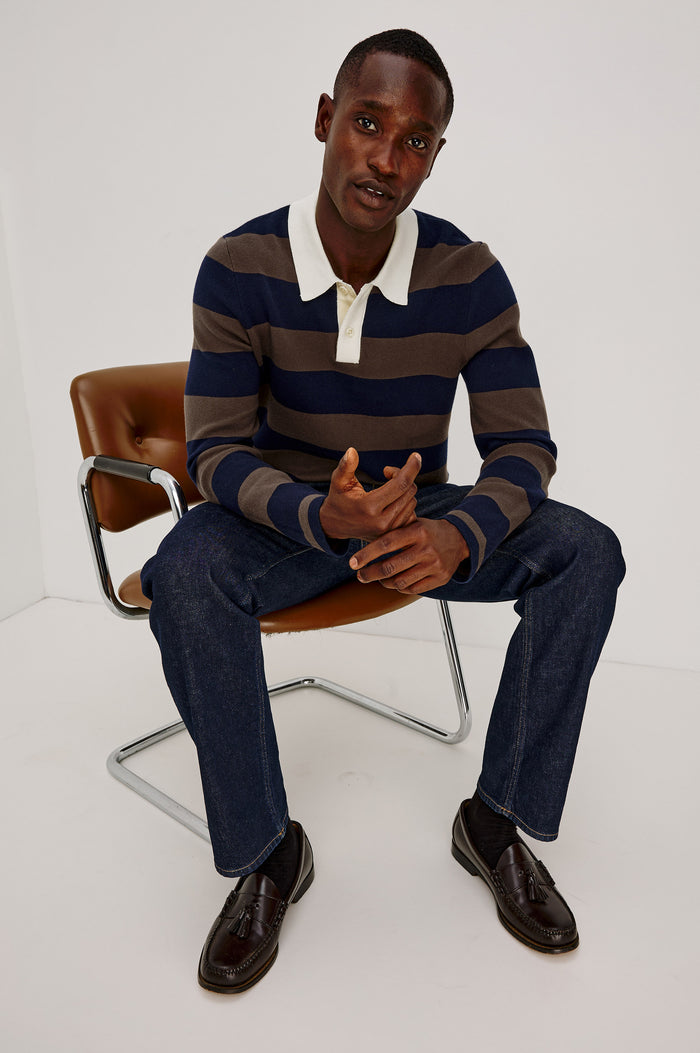 Luther Rugby Sweater in Cotton Knit With Contrast Polo Collar, Quarter-Button Placket, Relaxed Fit, and Long Sleeves in Navy Carob Stripe Colorway - Full Body View Featured on Model