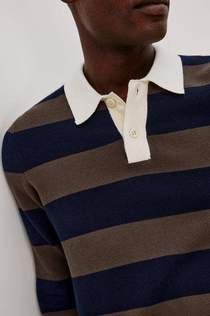 Luther Rugby Sweater in Cotton Knit With Contrast Polo Collar, Quarter-Button Placket, Relaxed Fit, and Long Sleeves in Navy Carob Stripe Colorway - Upper Body Front View Featured on Model