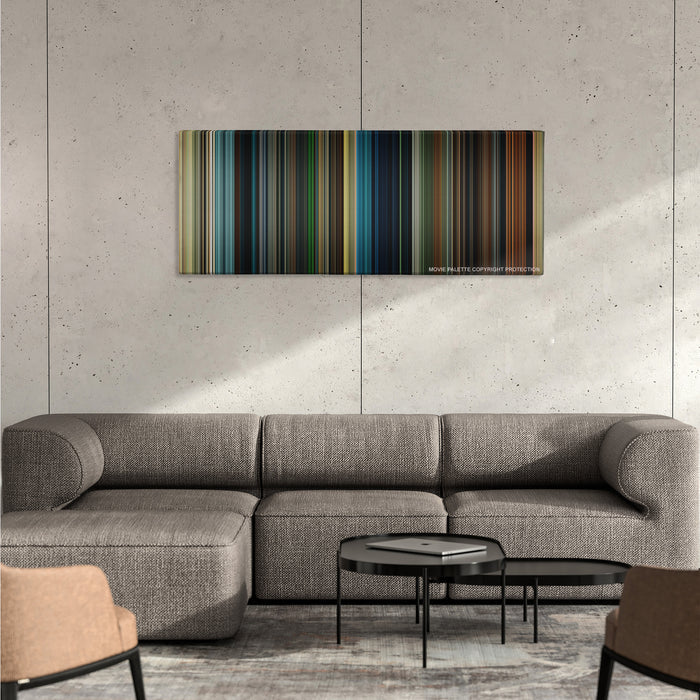 Maleficent color palette canvas on a concrete wall above a gray sectional sofa