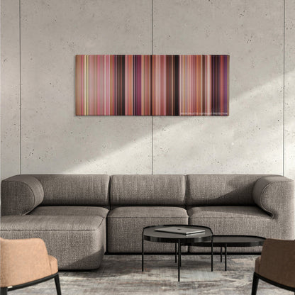 Mean Girls color palette canvas on a concrete wall above a gray sectional sofa
