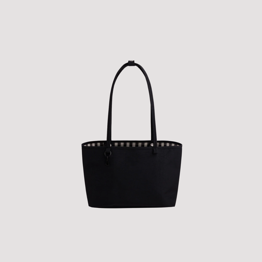 Medium reversible nylon tote with top handles and zip closure, black.