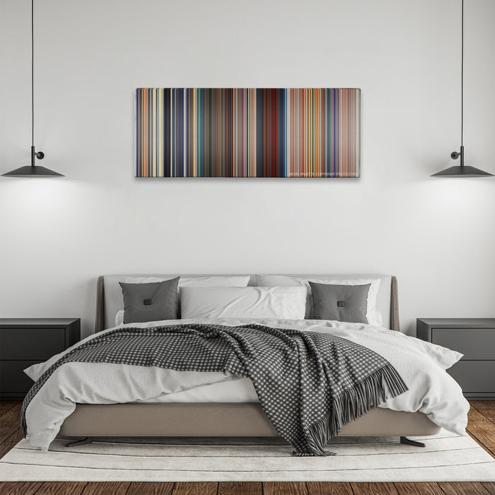 Megamind color palette canvas above a bed, between two black pendant lamps