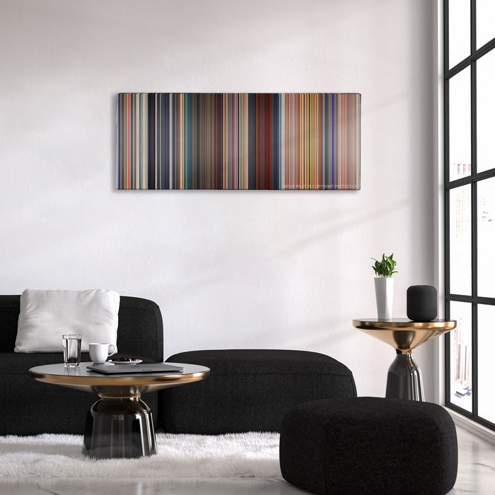 Megamind color palette canvas above a black sofa with a gold-topped table