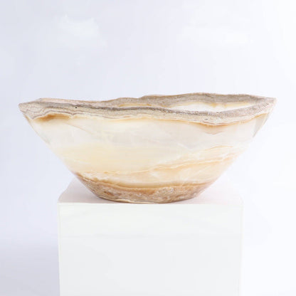Mexican Onyx/Calcite Bowl 10" featuring warm amber and honey tones hand-carved with an organic rim.