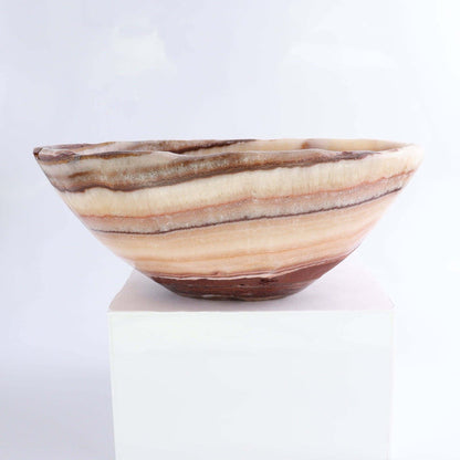Mexican Onyx/Calcite Bowl 10" showcasing warm amber and honey tones, perfect for decor or storage.