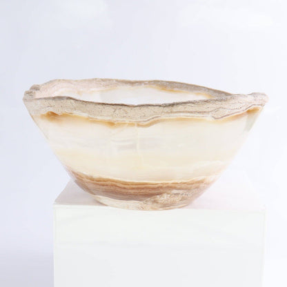 Mexican Onyx/Calcite Bowl 10" showcasing warm amber and honey tones with a unique, organic rim.