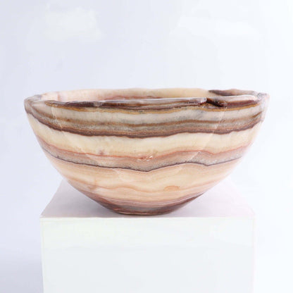 Mexican Onyx/Calcite Bowl 10" with rich amber banding and organic rim, perfect for fruit or decorative use.