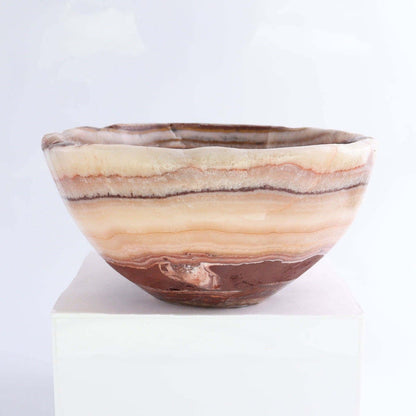 Mexican Onyx/Calcite Bowl 10" showcasing warm amber tones and natural banding, ideal for any decor.