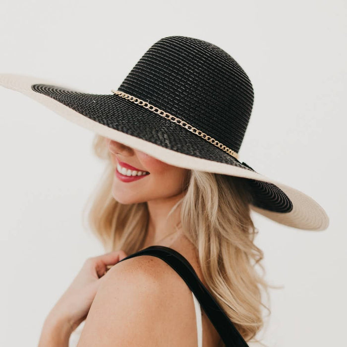 Wide-brimmed Miami Summer Sunhat by Pretty Simple featuring a floppy design and lightweight straw material for sun protection.