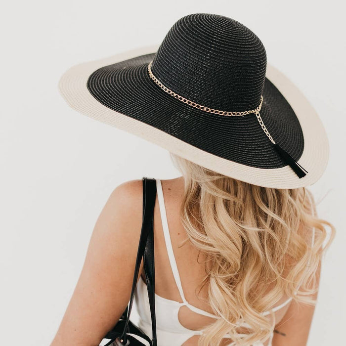 Wide-brimmed Miami Summer Sun Hat by Pretty Simple, floppy straw hat with wide brim perfect for sun protection and summer style.