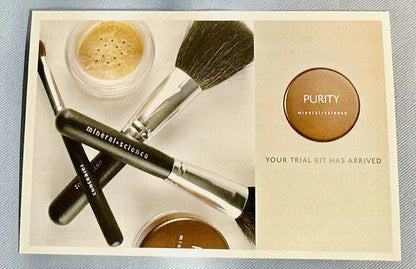 Mineral powder foundation set with two brushes and medium shade jars on a card.
