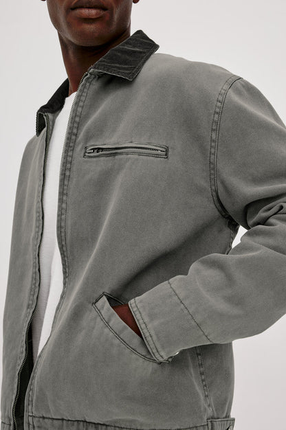 Morro Workwear Utility Jacket in Heavy Cotton Canvas Duck With Corduroy Collar, Chest Zip Pocket, Side Welt Pockets, and Custom Dobby Lining in Graphite Colorway - Upper Body Close Up View Featured on Model