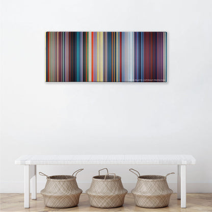 Mulan color palette canvas above a white bench with three woven baskets