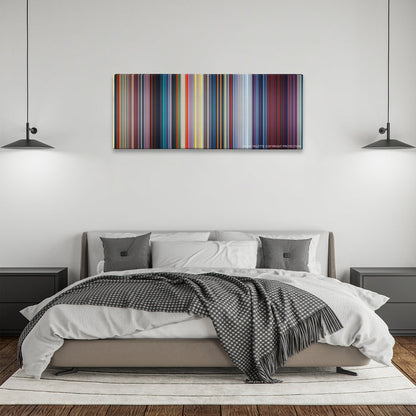 Mulan color palette canvas above a bed, between two black pendant lamps