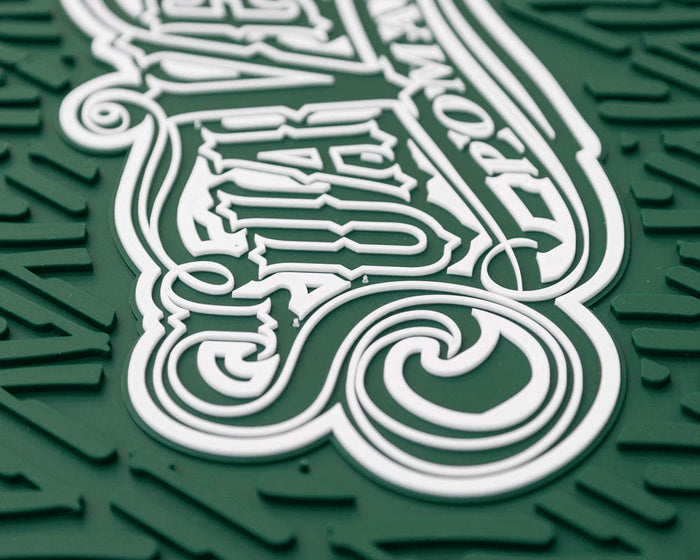 Green OG Script Barber Mat Closeup