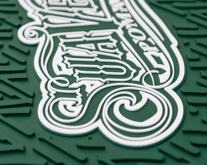 Green OG Script Barber Mat Closeup