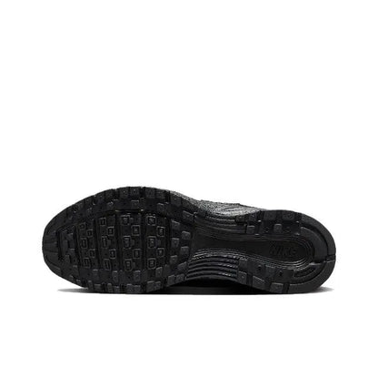 Black sneaker outsole with traction tread and textured rubber pattern