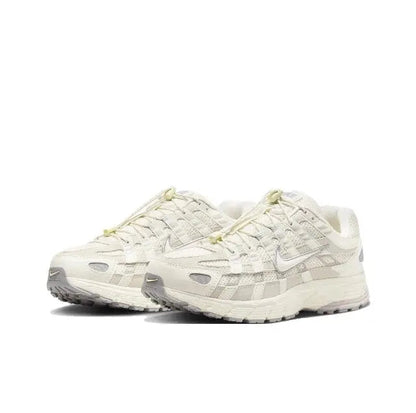 Beige Nike P-6000 sneaker side view with layered midsole and textured upper