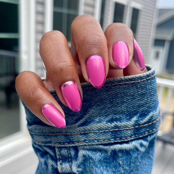 Pink Chrome Outline - Press-On | Medium | Almond nails in vibrant pink with a sleek chrome border for an easy at-home mani