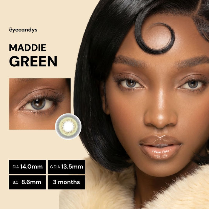 Close-up of a woman with smooth skin and shiny black hair styled with a curl on her forehead, wearing EyeCandys Pink Label Maddie Green color contacts. Inset shows her eye and lens details: DIA 14.0mm, G.DIA 13.5mm, B.C 8.6mm, 3-months use.