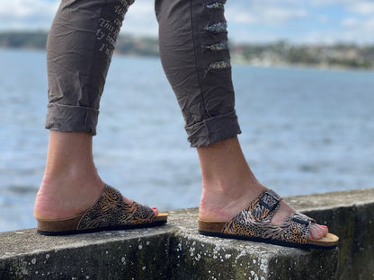 European made women's sandals. comfortable contoured cork footbed slide sandals. Quality leather sandals. In leopard animal print