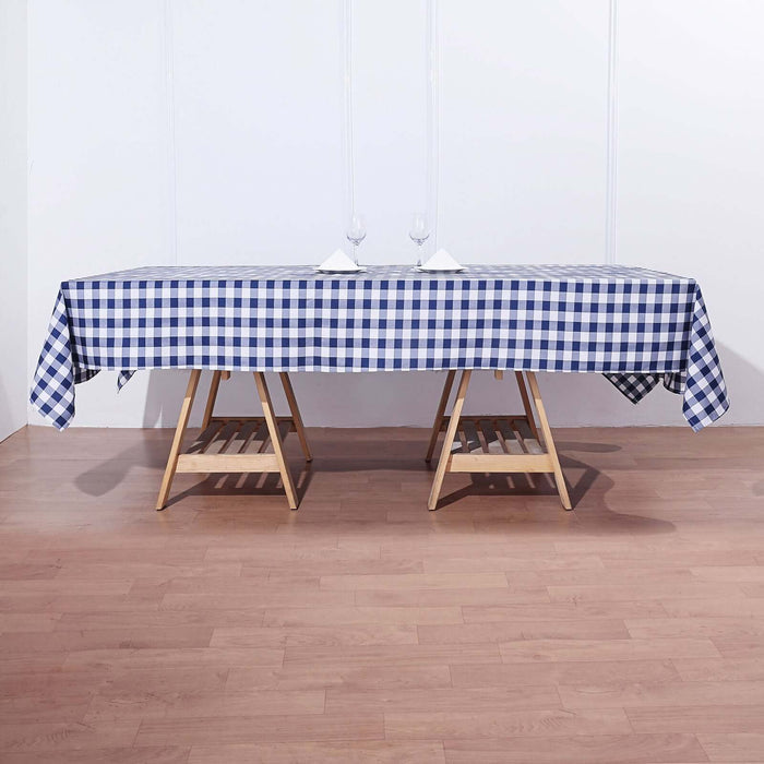 Blue and white checkered tablecloth on a wooden table