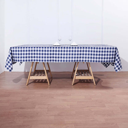 Blue and white checkered tablecloth on a wooden table