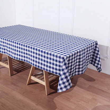 Blue and white checkered tablecloth on a wooden table.
