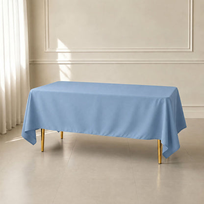 Dusty blue polyester rectangle tablecloth, 72"x120", wrinkle-resistant finish.