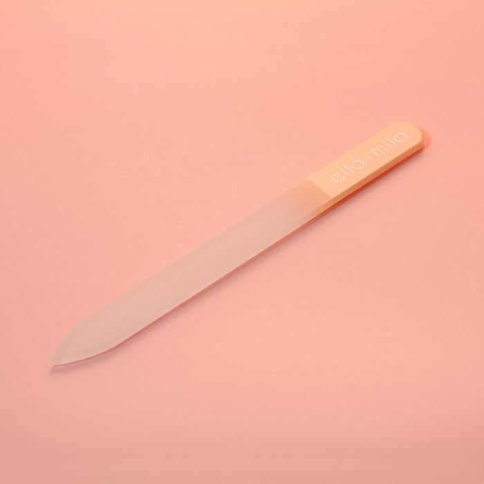 Prime Mani and Pedi Kit peach ombre glass nail file on a peach background