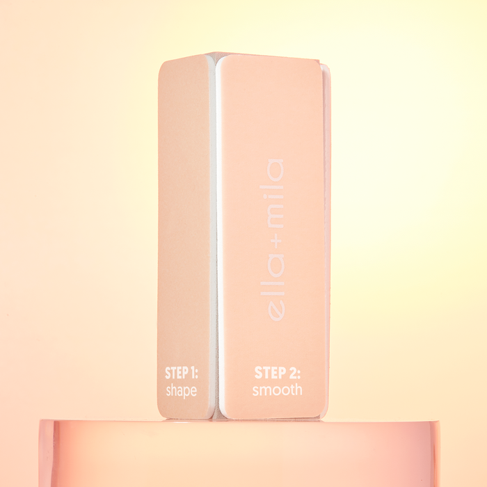 Prime Mani and Pedi Kit peach nail buffer block on a peach background