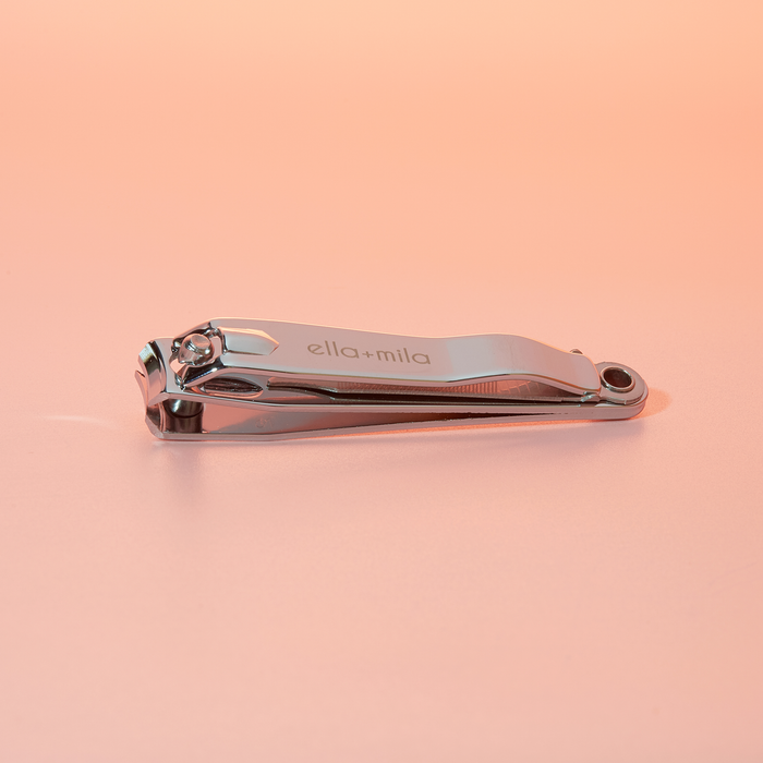 Prime Mani and Pedi Kit stainless steel nail clipper on a peach background
