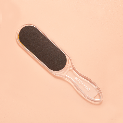 Prime Mani and Pedi Kit dual-sided foot file on a peach background